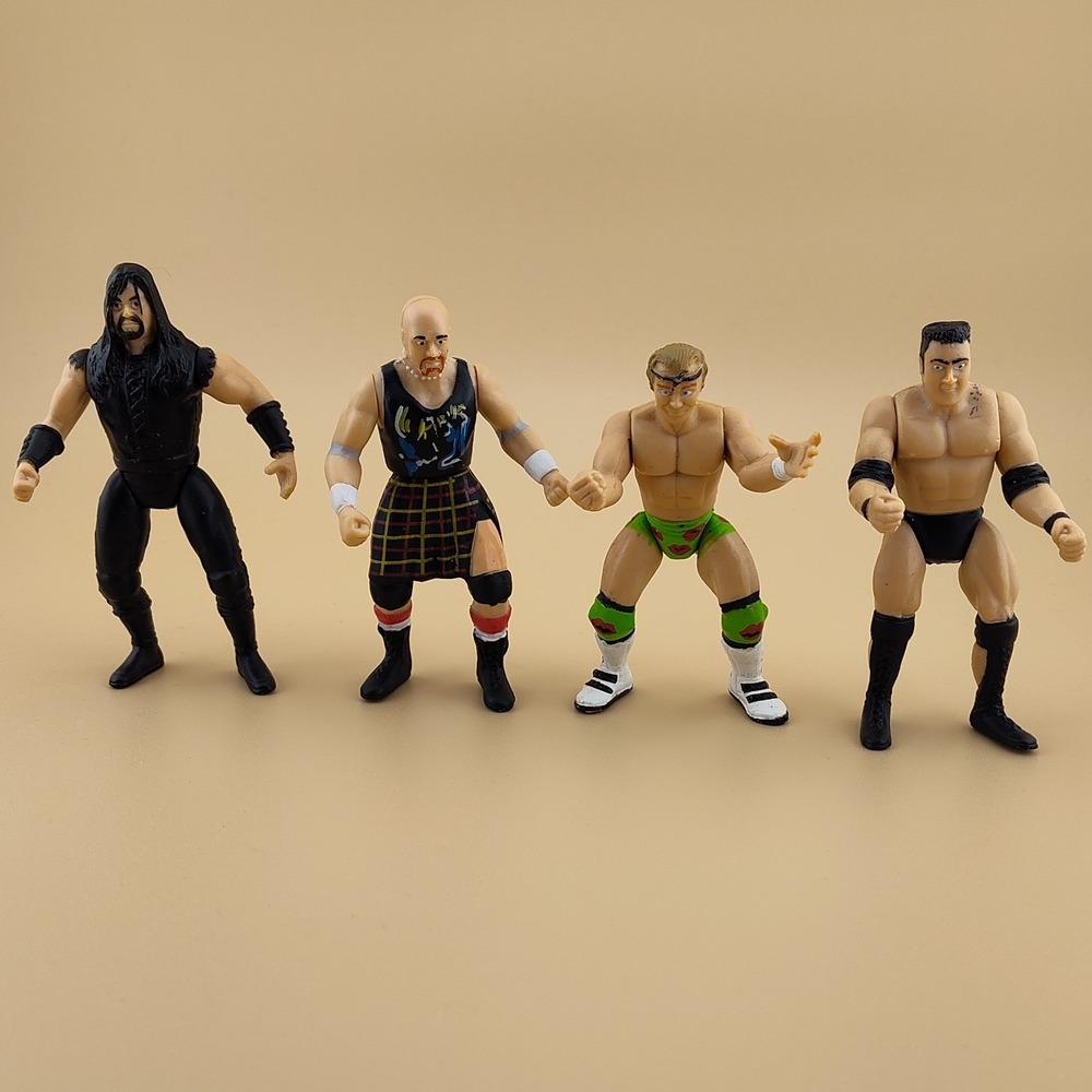 Vintage Undertaker Roddy Piper B.A. Billy Gunn The Rock wrestling figures toys